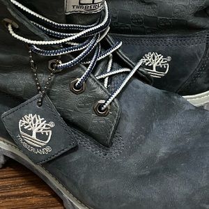 Blue suede Timberland roll down boots.